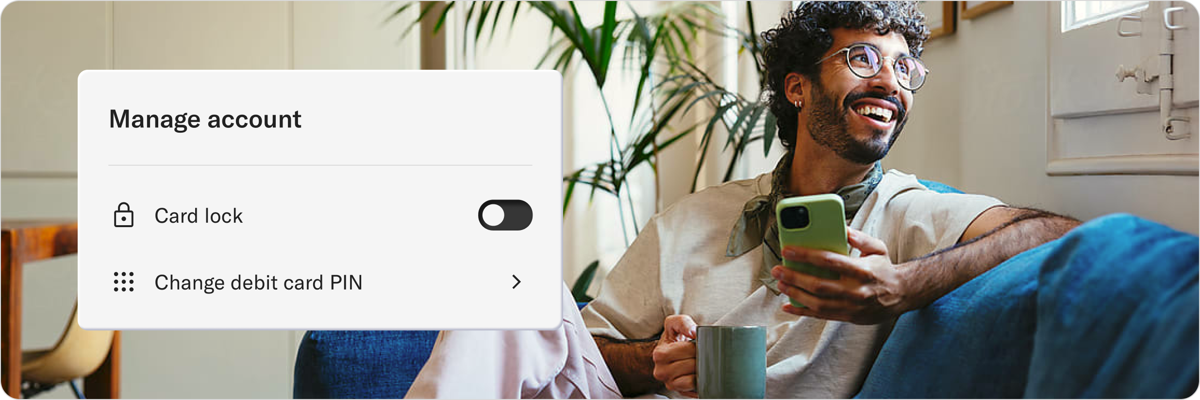 Person relaxing at home with phone and mug