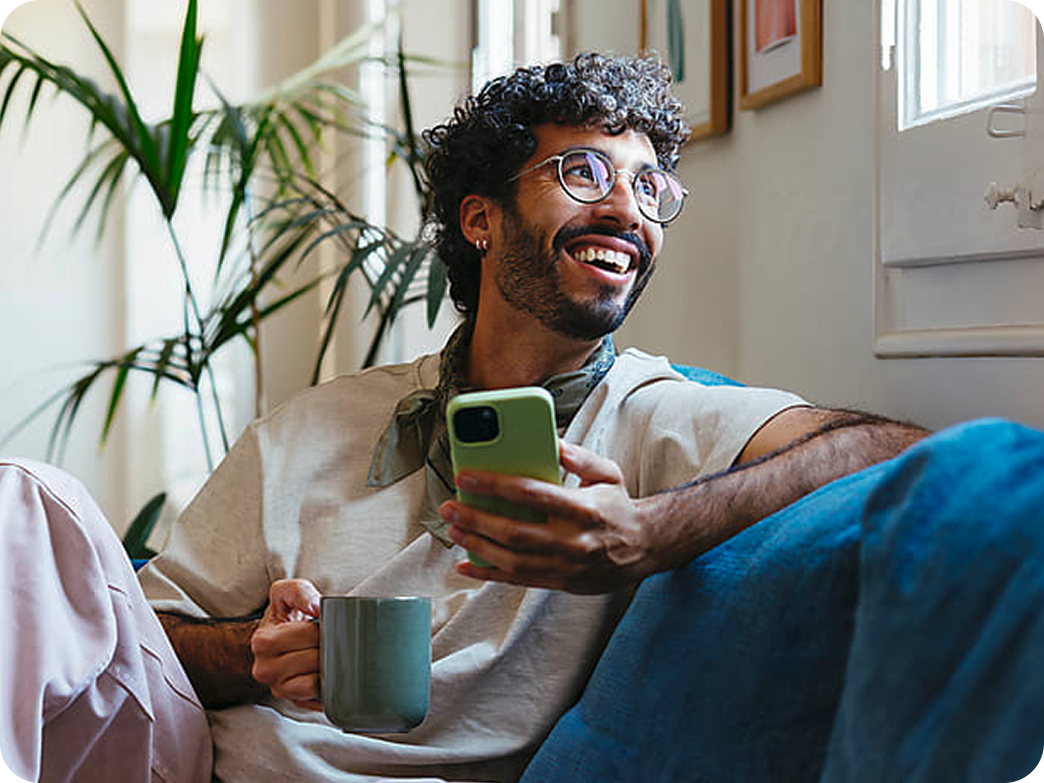 Smiling person near window